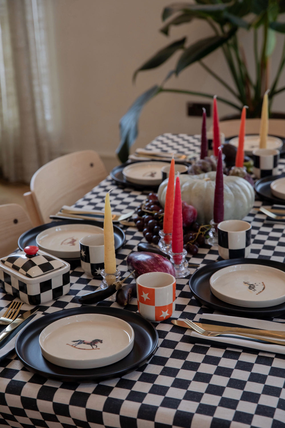 Kika Bespoke black and white tablecloth styled for a dramatic Halloween tablescape