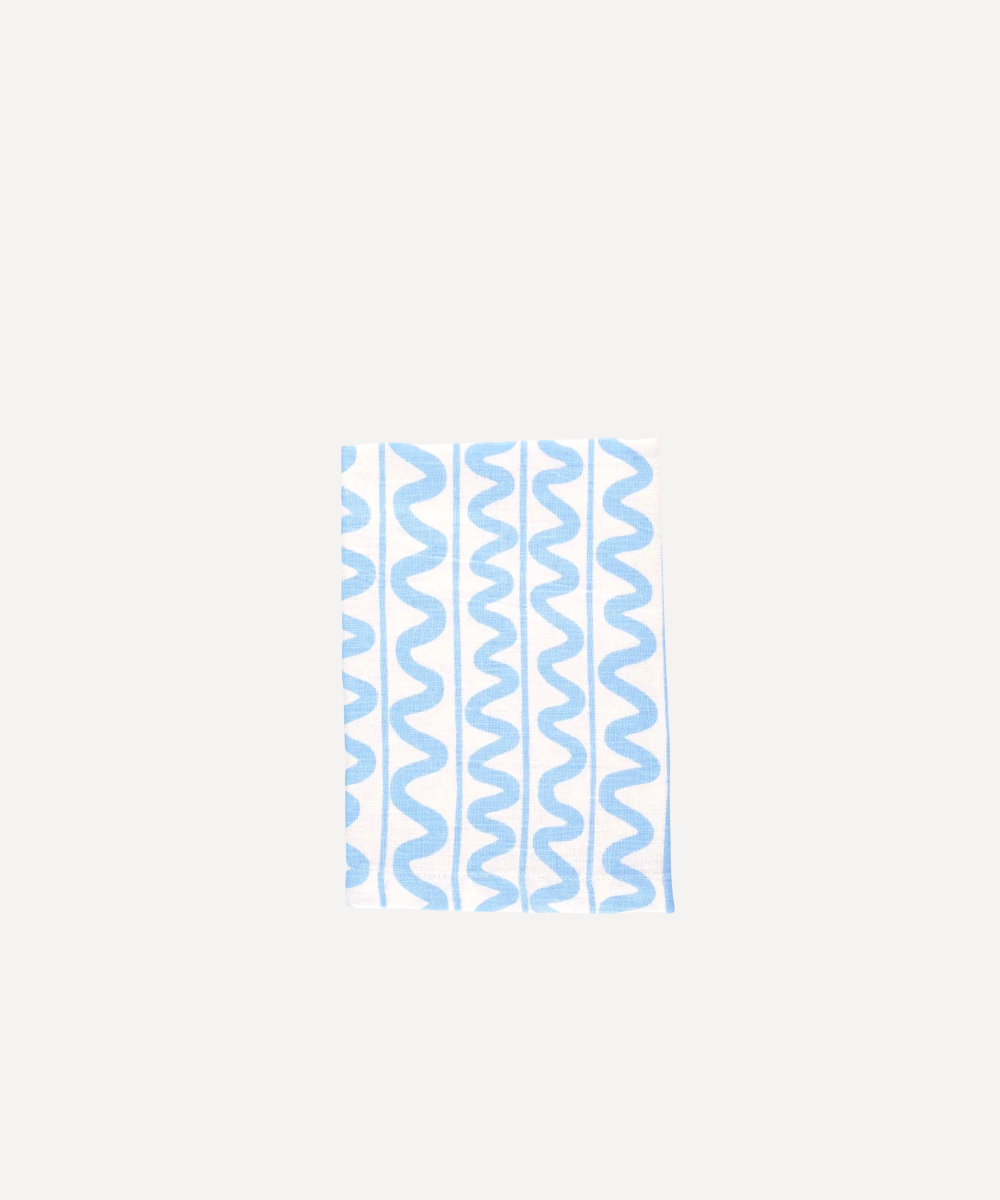 Blue zigzag pattern napkin on a white background