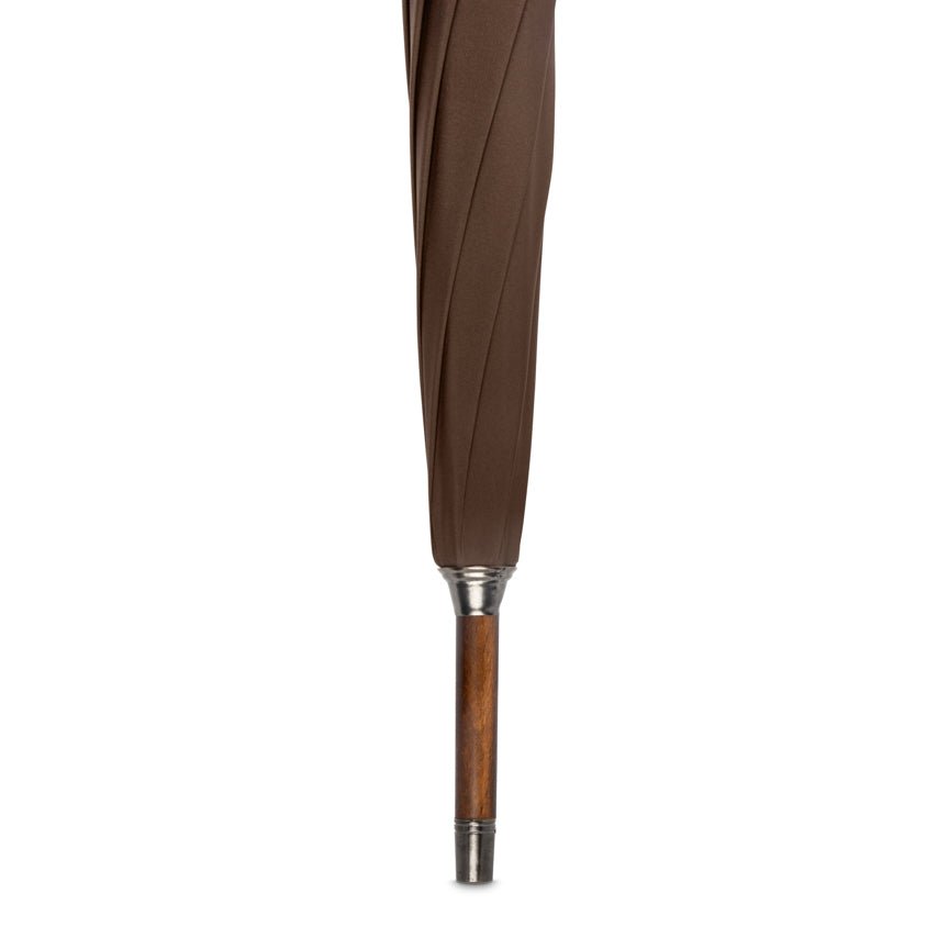 Brown umbrella with wooden handle on a white background