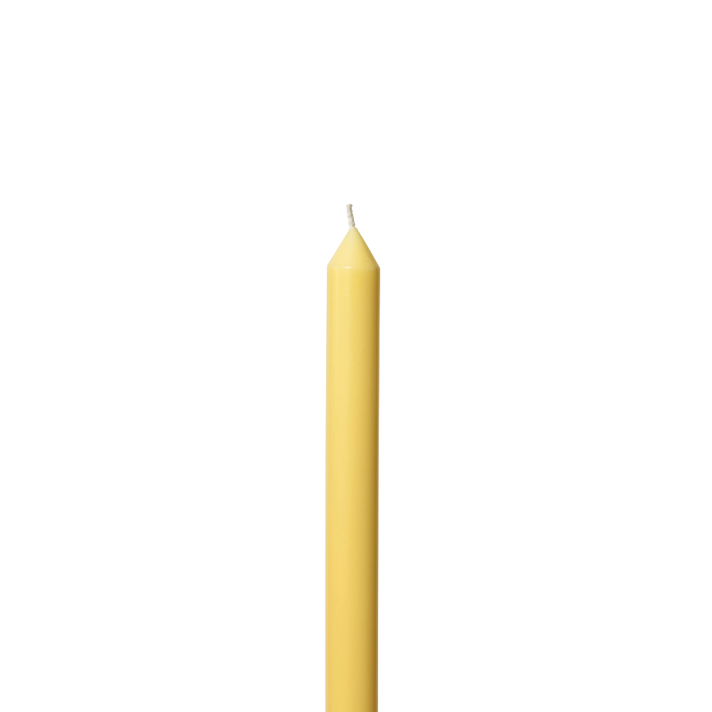 Butter Yellow metre long candle on a white background