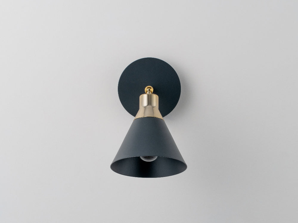 Adjustable charcoal wall light used for reading