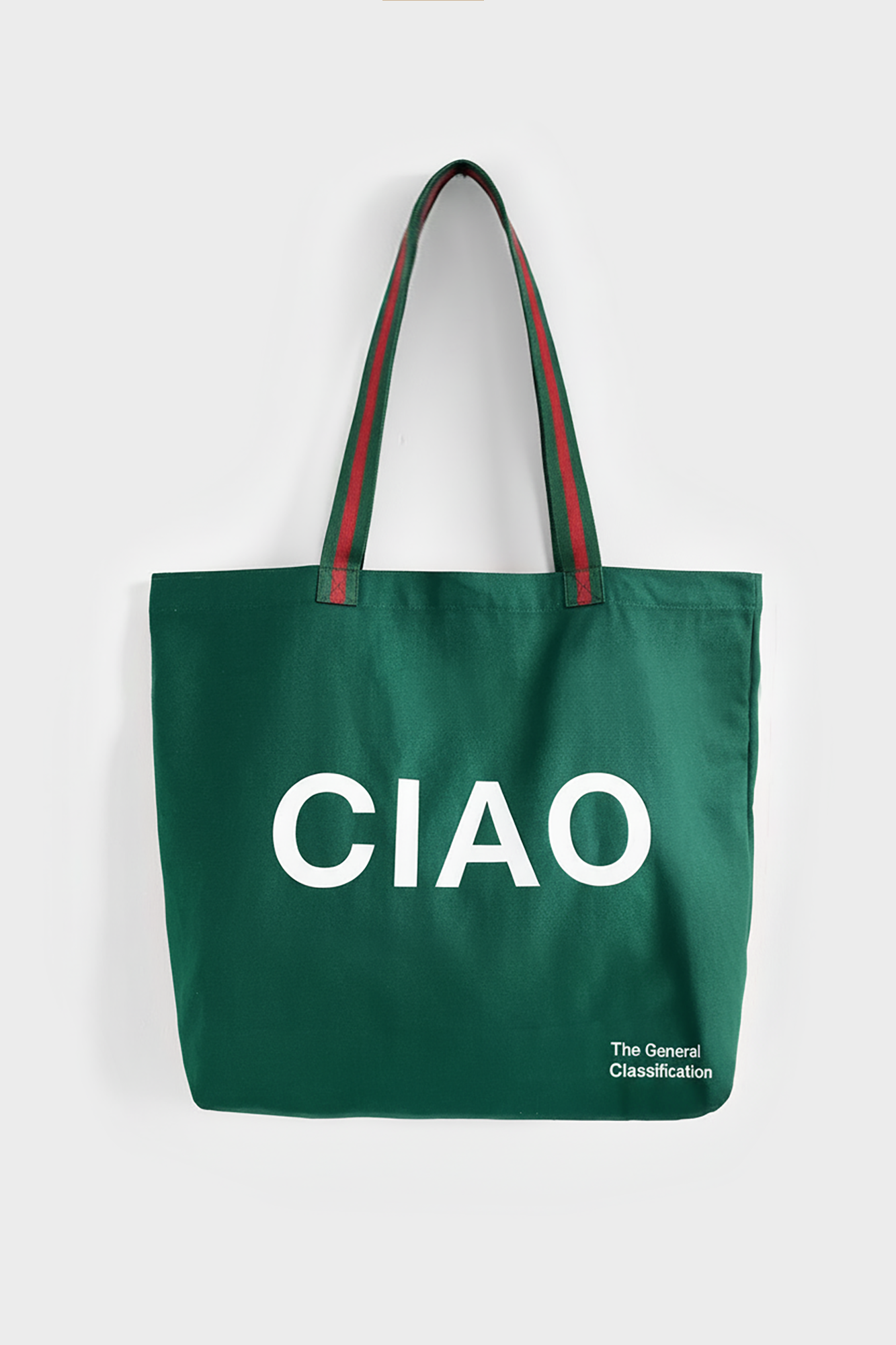 Green tote bag with 'CIAO' text on a white background
