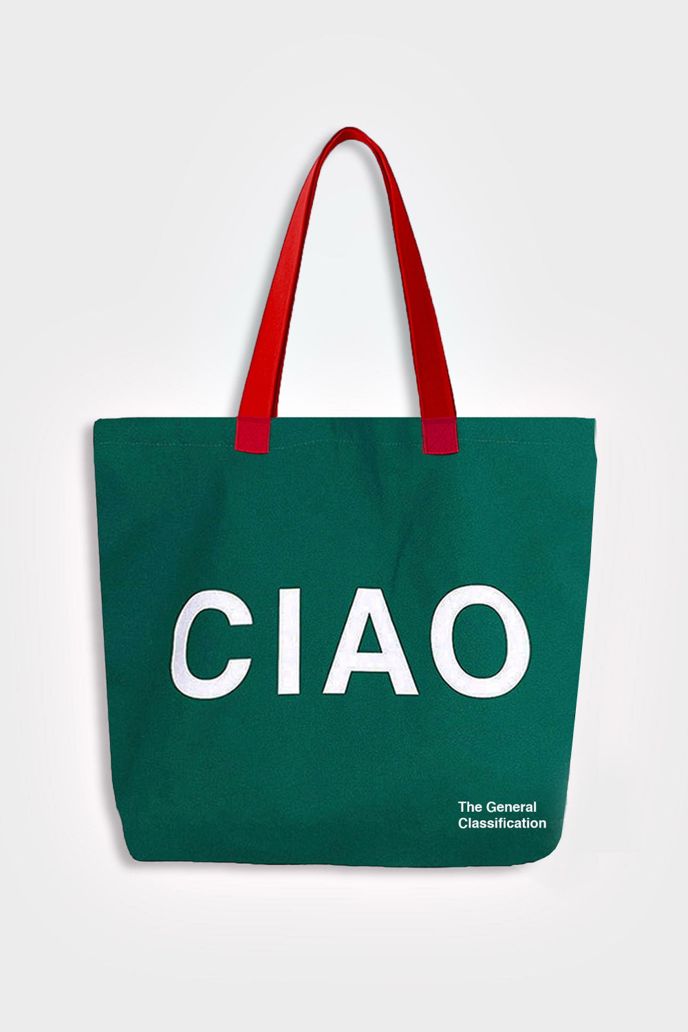 Green tote bag with 'CIAO' text and red handles on a white background