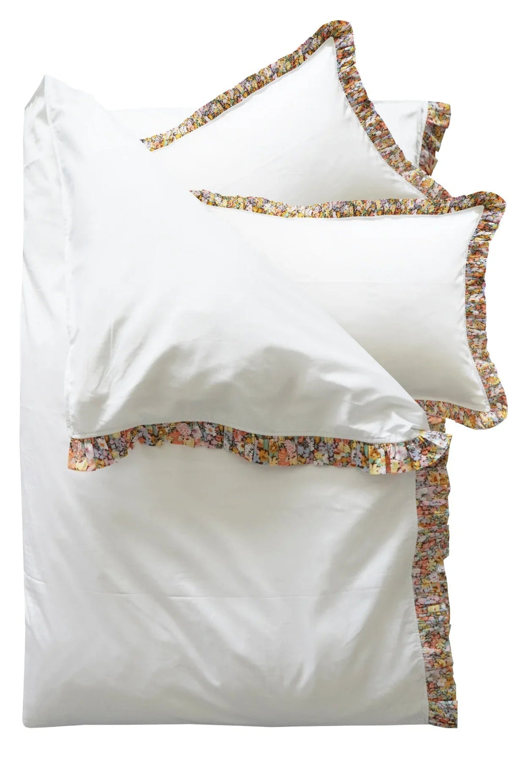 White pillowcases with floral trim on a white background
