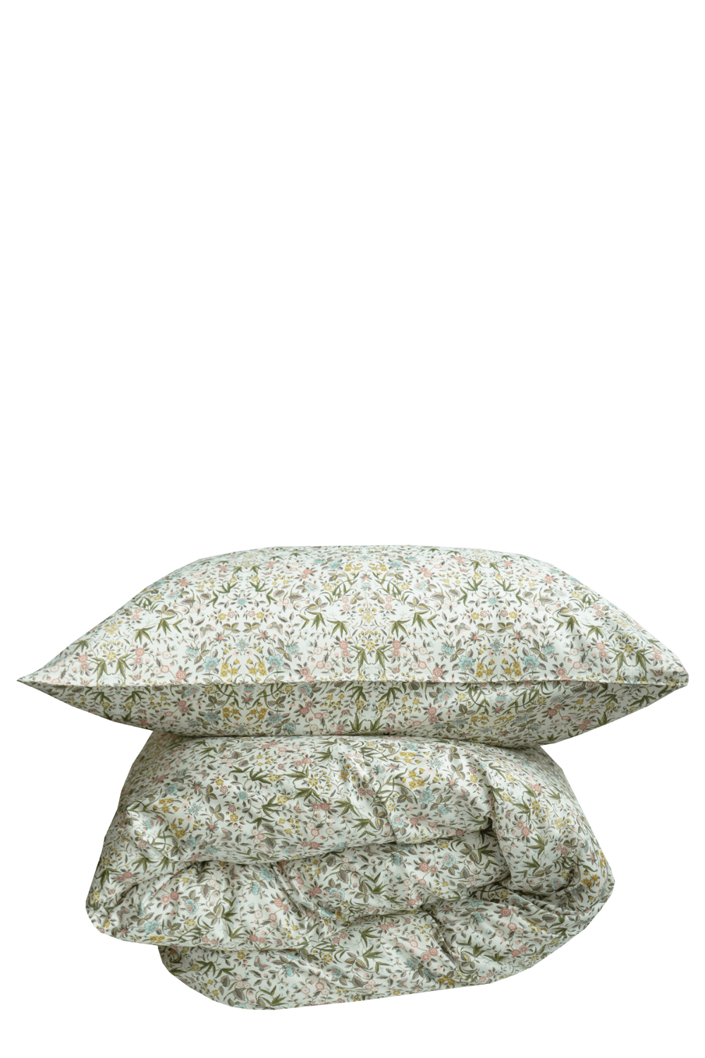 Floral-patterned pillow and blanket set on a solid background
