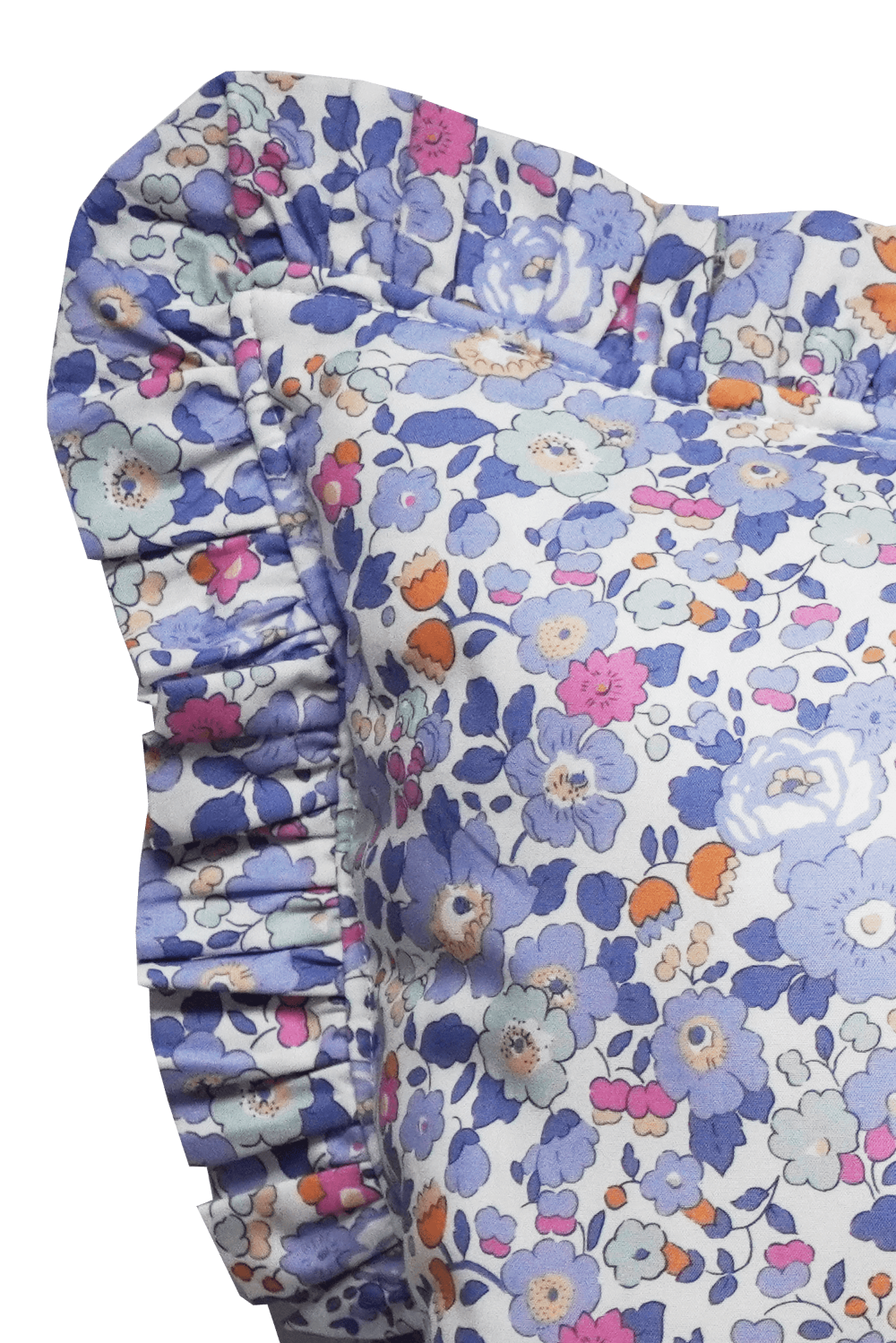 Floral patterned fabric lumbar cushion with ruffled edge on a dark background