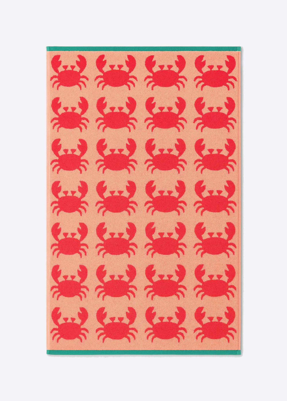 Towel with red crab pattern on a pink background