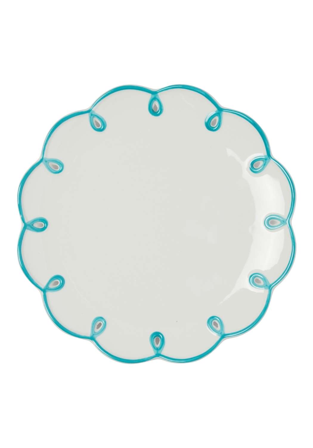 White plate with turquoise decorative scalloped edges on a white background