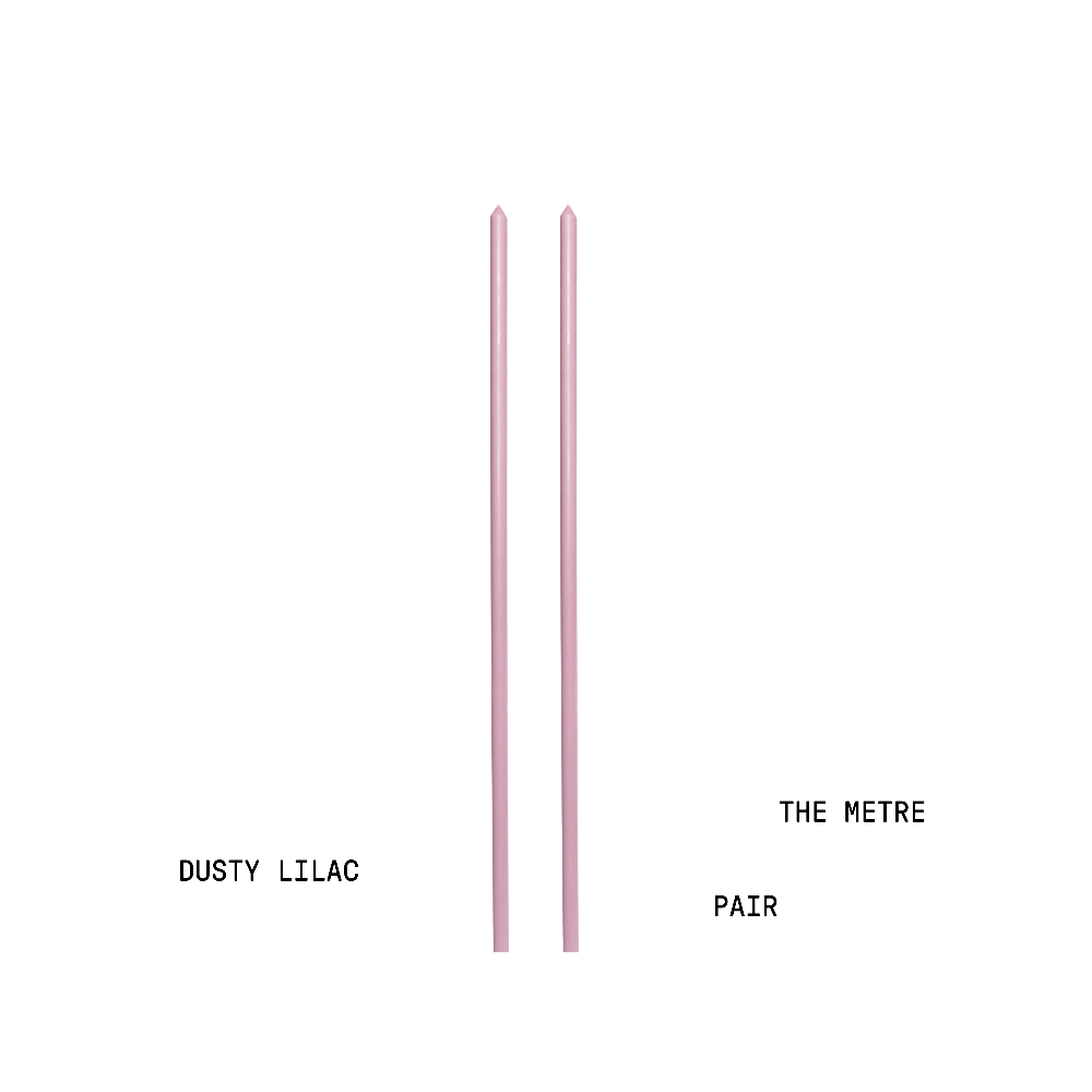 Two lilac tapered candles with text indicating colour and measurement on a white background