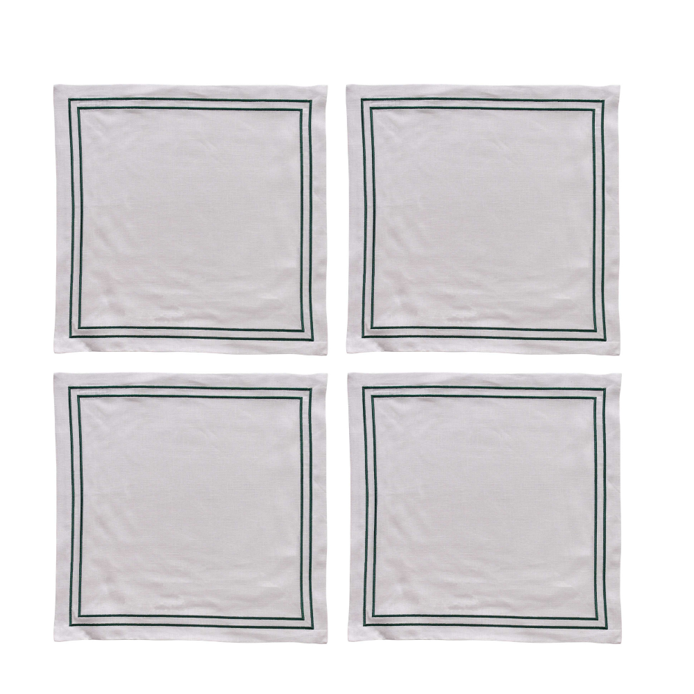 Four white napkins with emerald green striped borders on a white background