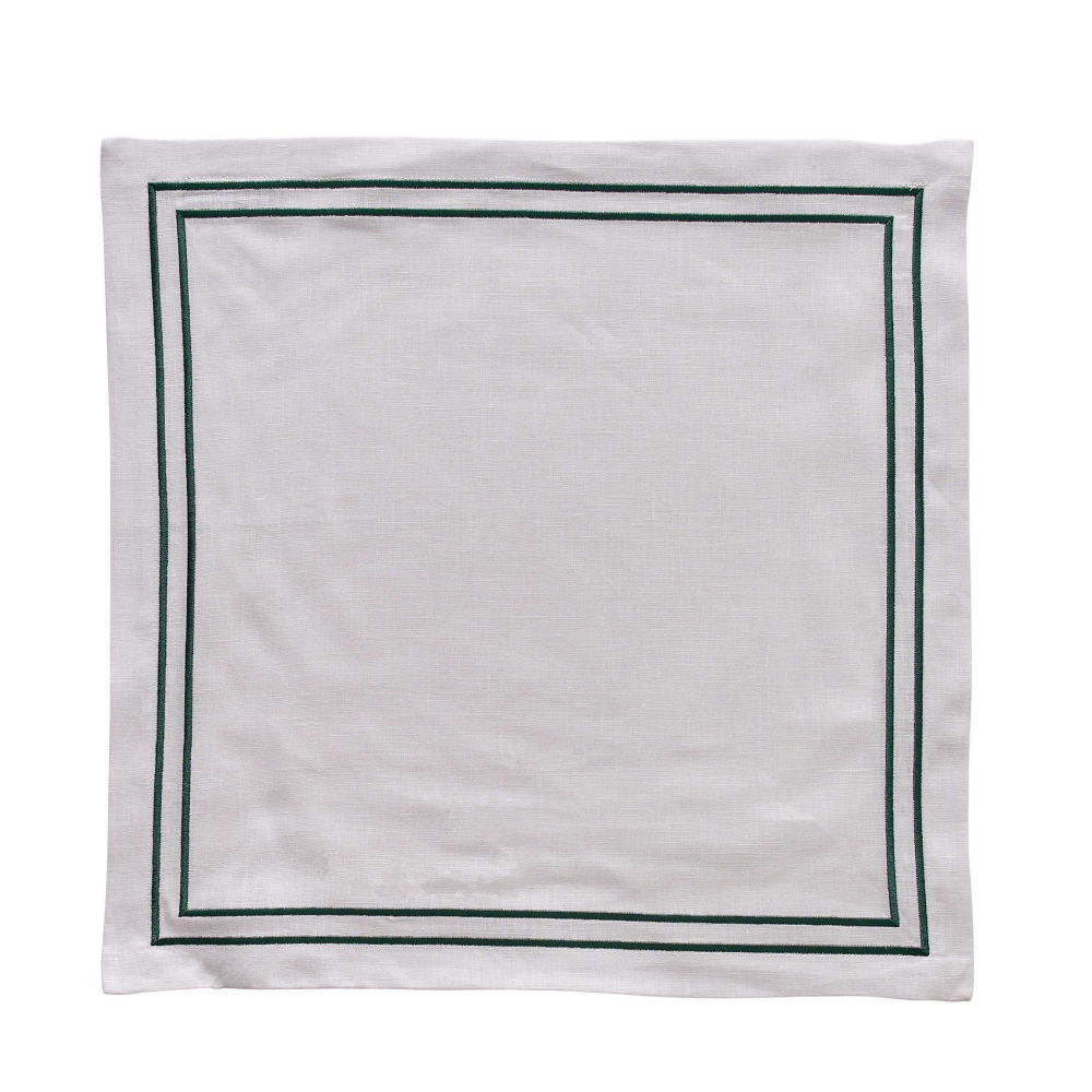 White napkin with green border on a white background