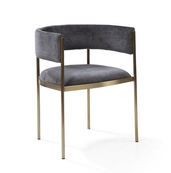 Dining chair with grey cushioned seat and backrest on a gold frame against a white background