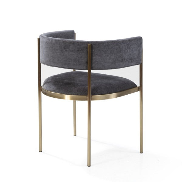 Chair with grey cushioned seat and backrest on a gold frame against a white background