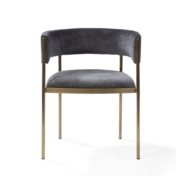 Gray upholstered chair with gold metal legs on a white background