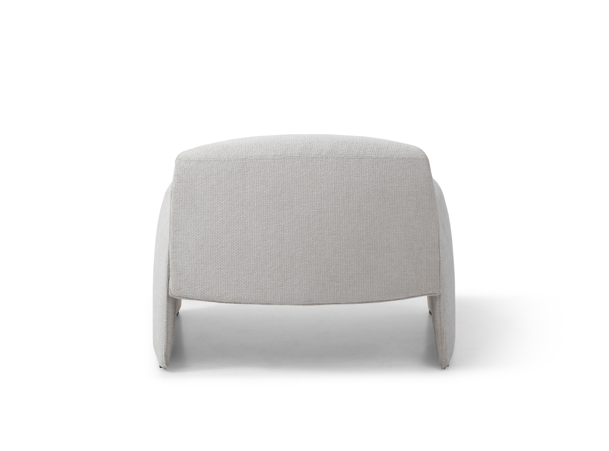 Cream lounge armchair on a white background