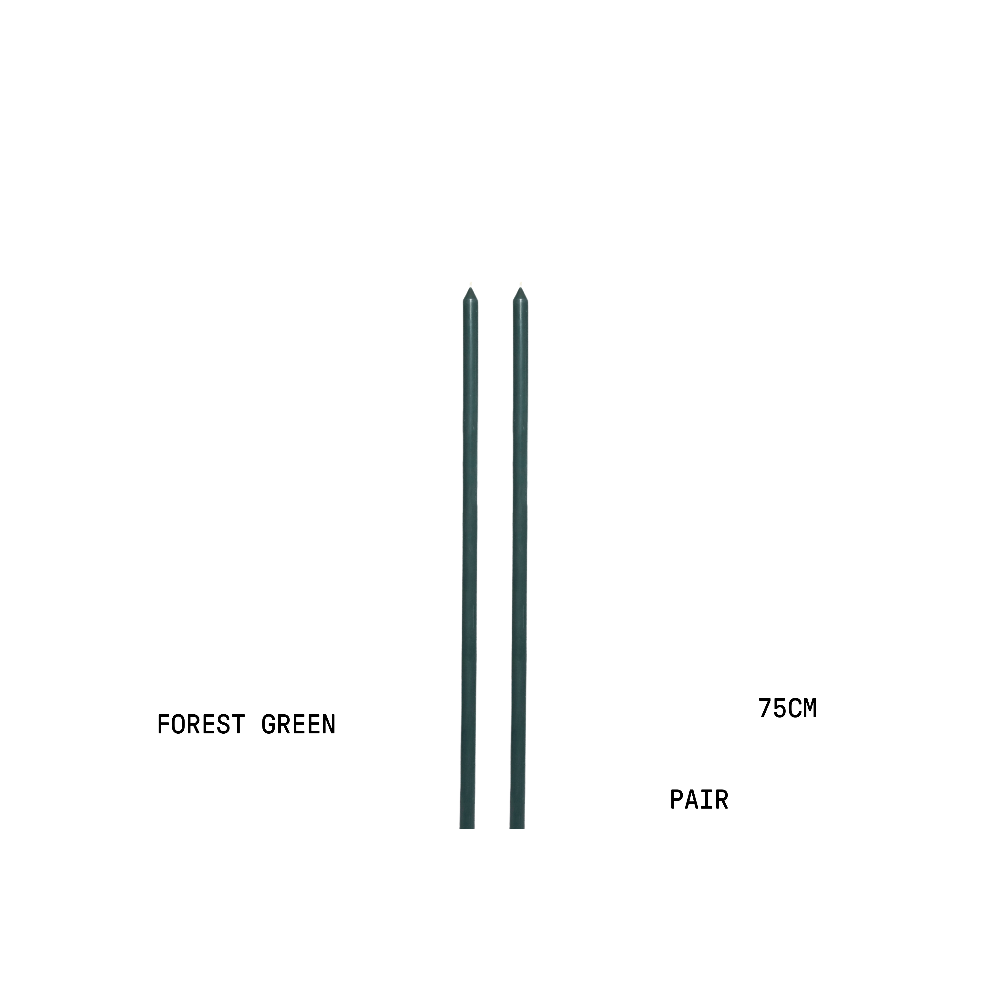 Two forest green tapered candles with measurements on a white background
