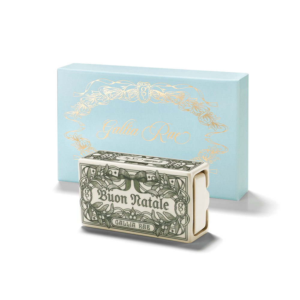 Buon Natale ceramic trinket box displayed in front of Gallia Rae's pale blue gift packaging