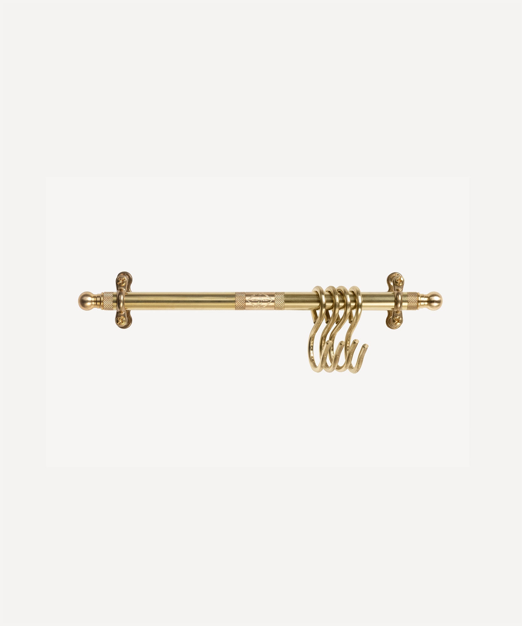 A brass kitchen rail rod with decorative finials on each end and a coiled hanger attached, shown against a plain white background.