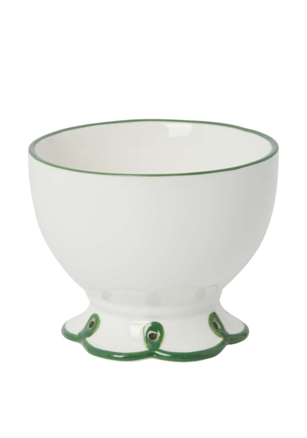 White ceramic bowl with green accents and a scalloped edge bottom on a white background