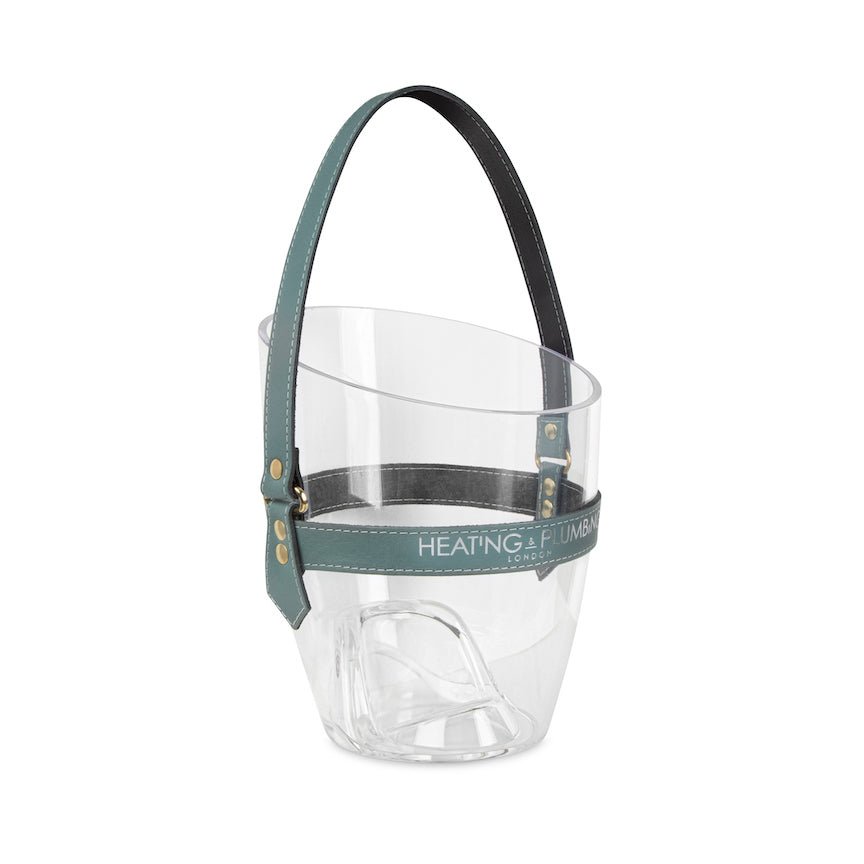 Clear champagne bucket with a green strap on a white background