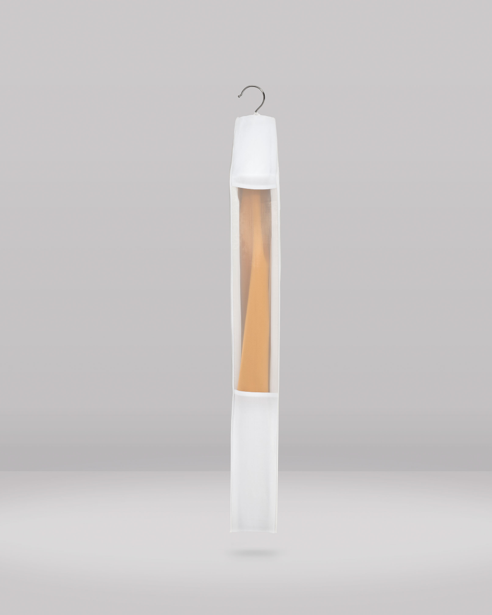 White hanging bag for clothes in warbrobe or storage