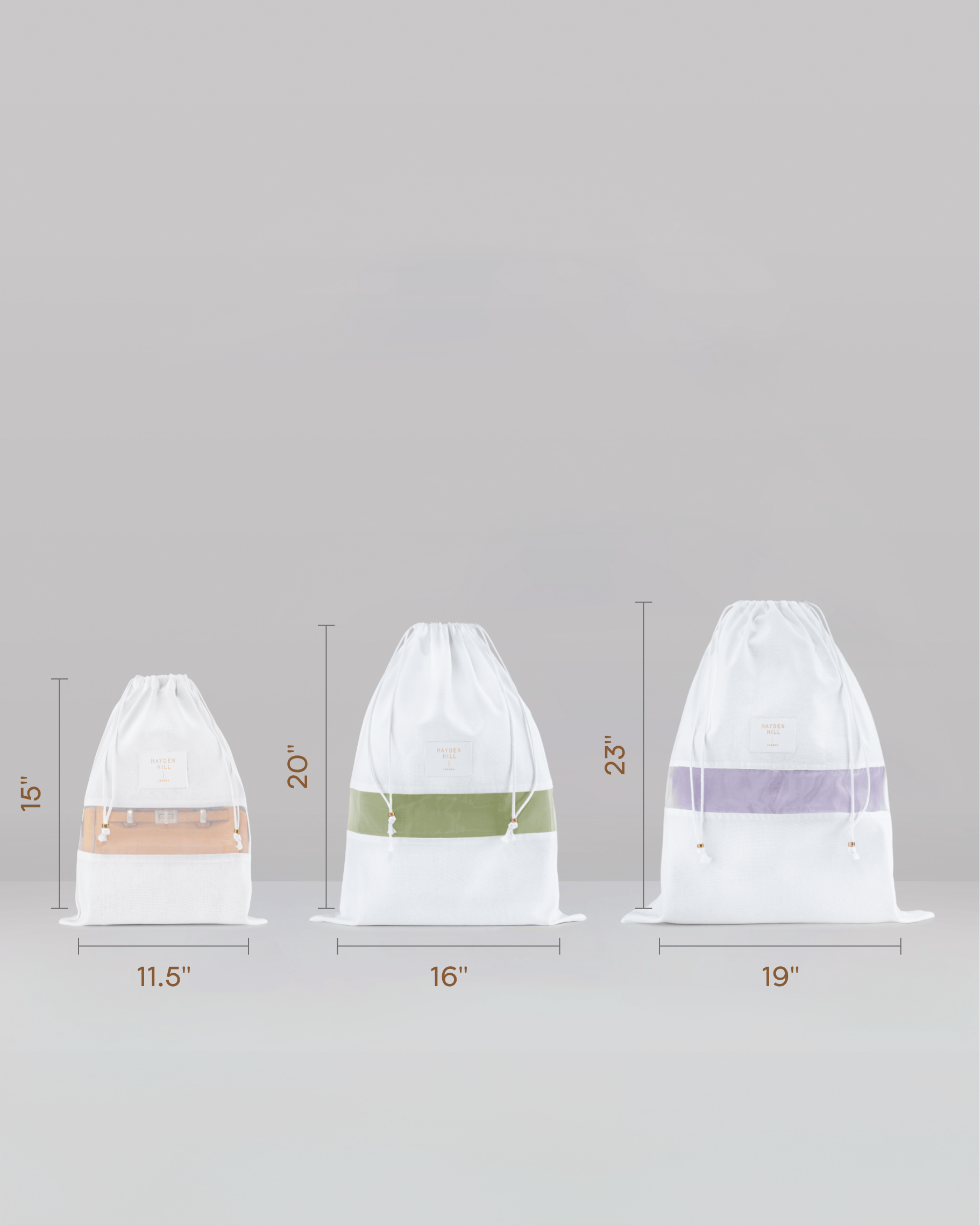 Three white drawstring storage bags shown side by side with height and width dimension labels: 11.5 inches by 15 inches, 16 inches by 20 inches, and 19 inches by 23 inches, on a light grey background.
