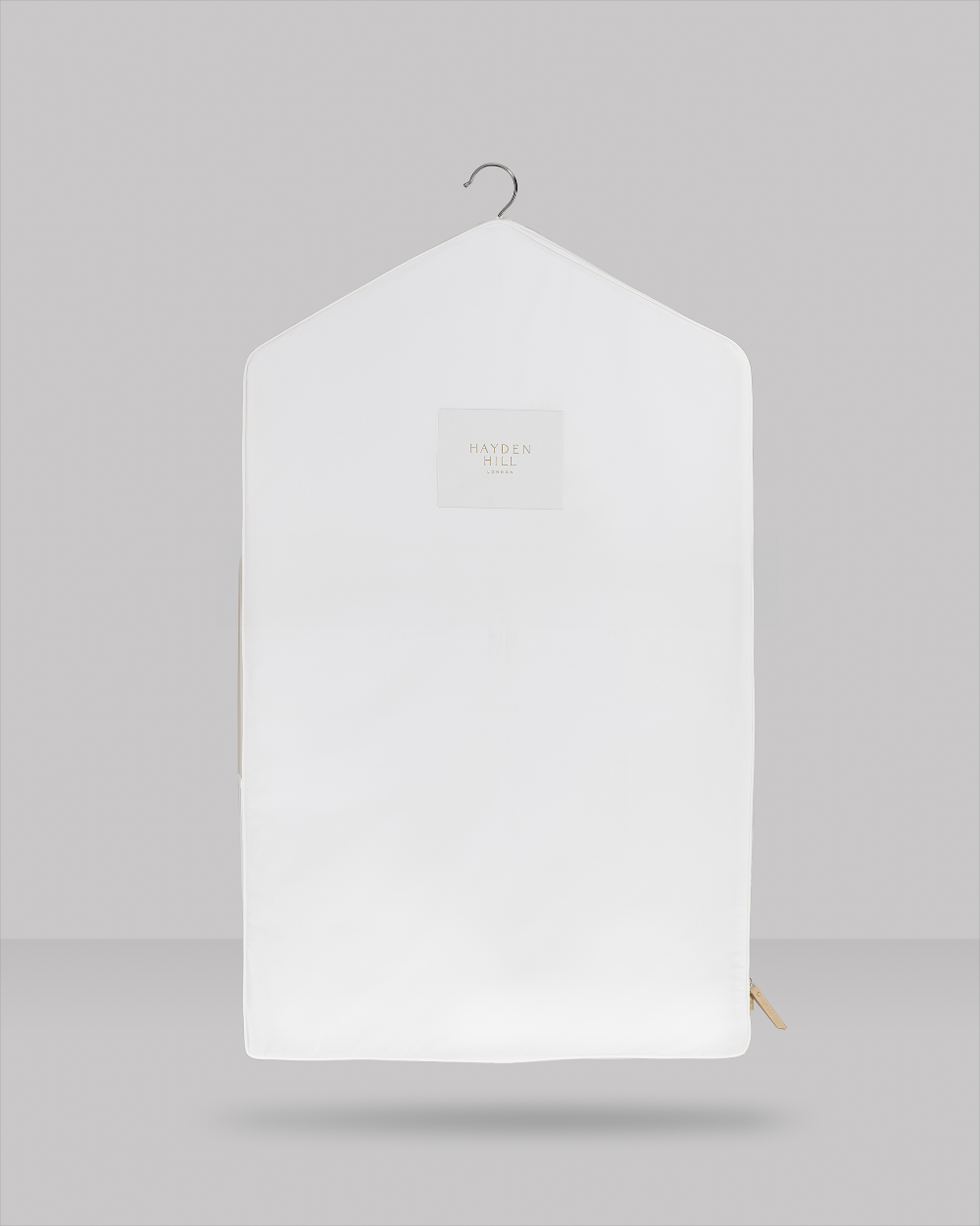 White garment cover with a Hayden Hill logo on a grey background