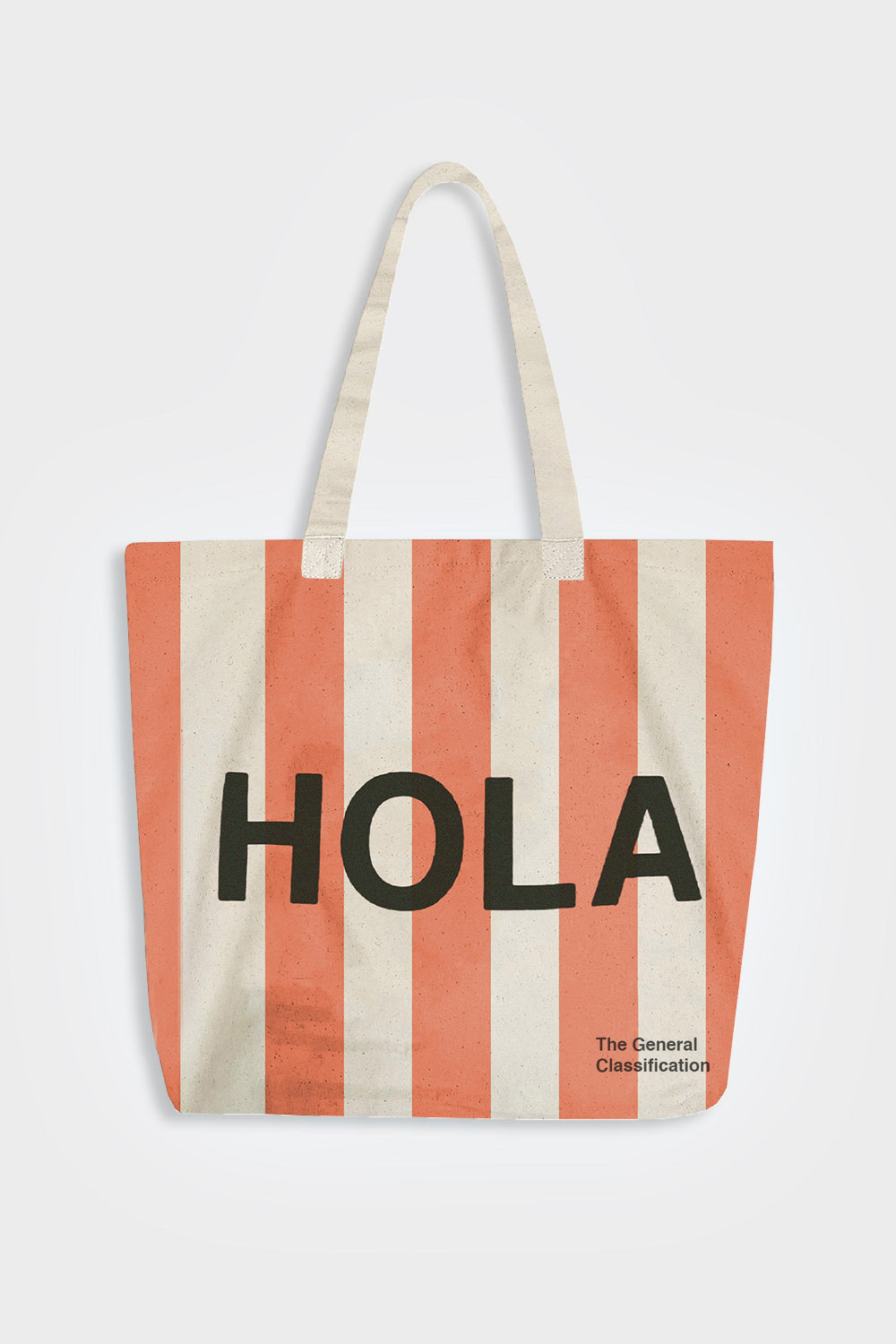 Striped tote bag with 'HOLA' text on a white background