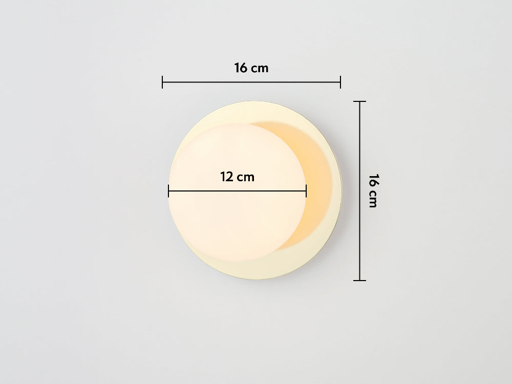 Round light fixture with dimensions on a grey background
