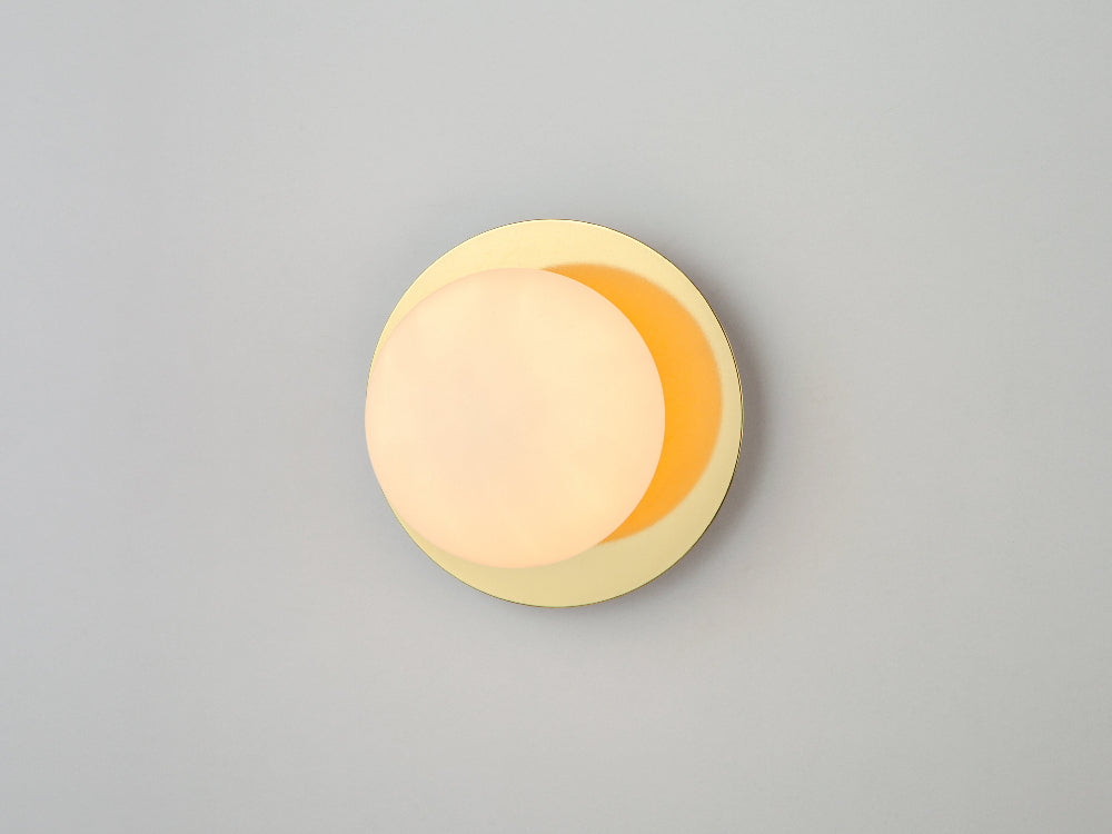 IP44 brass and opal glass wall light suitable for bathroom use