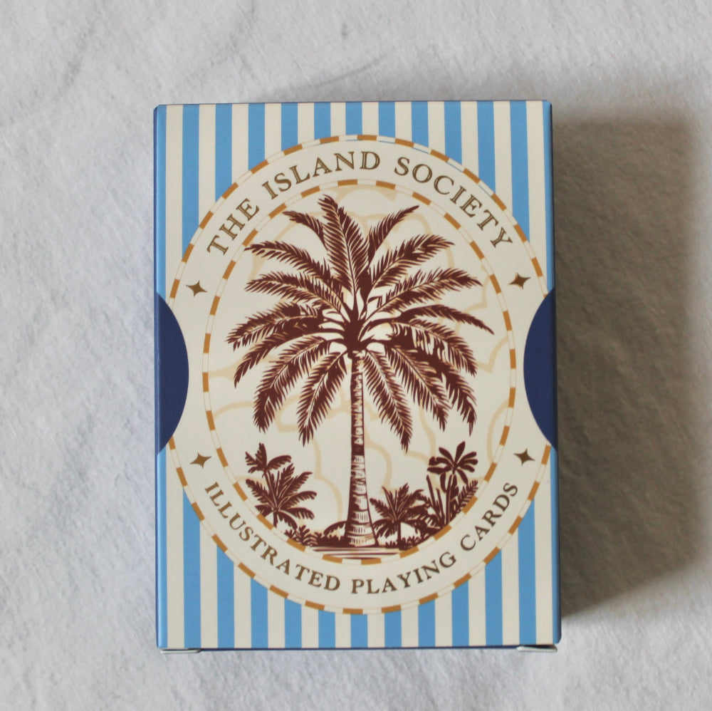 Blue illustrated playing cards from The Island Society luxury double deck collection.