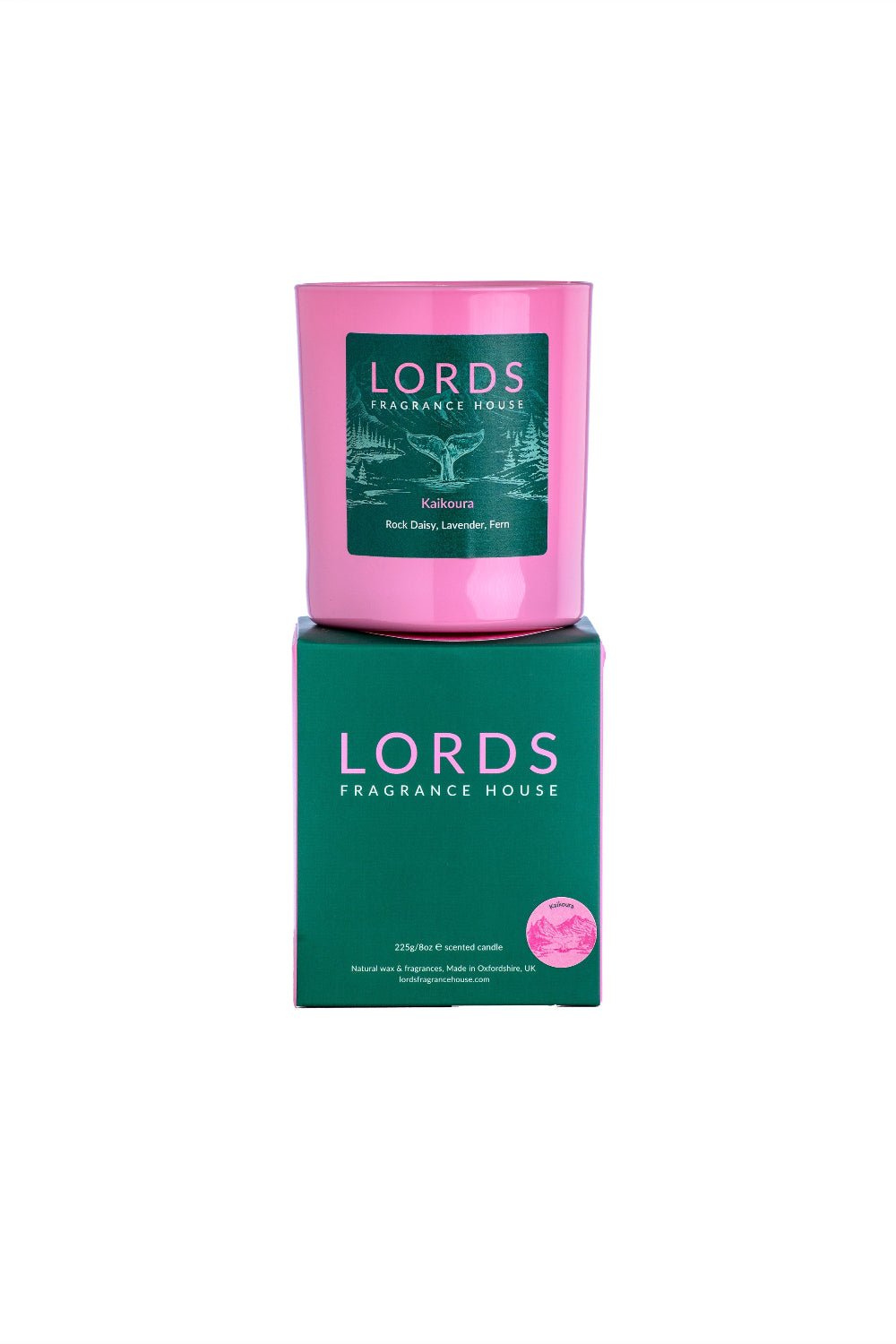 Pink candle with green label on a green box labelled 'LORDS FRAGRANCE HOUSE' on a white background