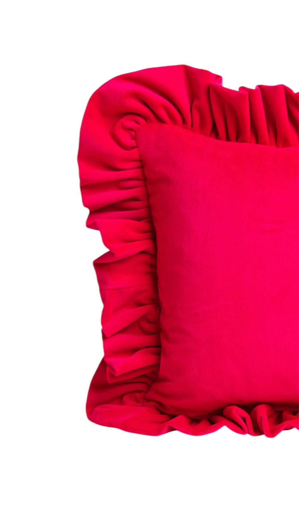 Pink pillow with ruffled edge on a white background