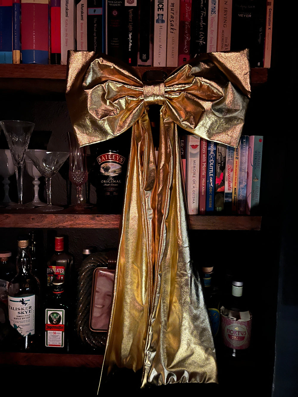 Kika Bespoke gold foil bow styled as part of a festive interior