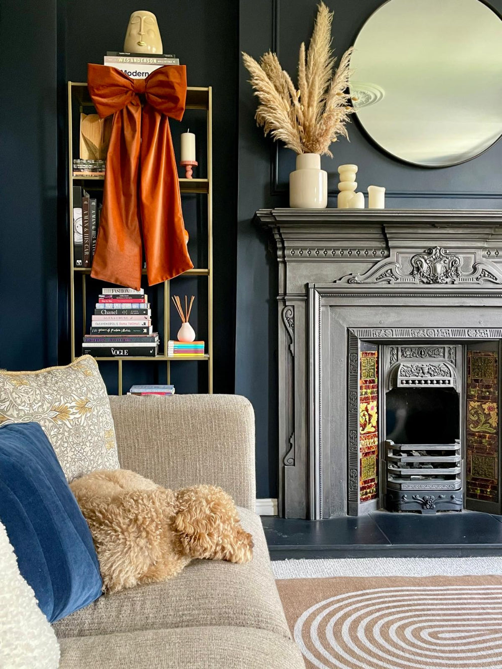 Kika Bespoke rust velvet bow styled on a shelf as seasonal decoration