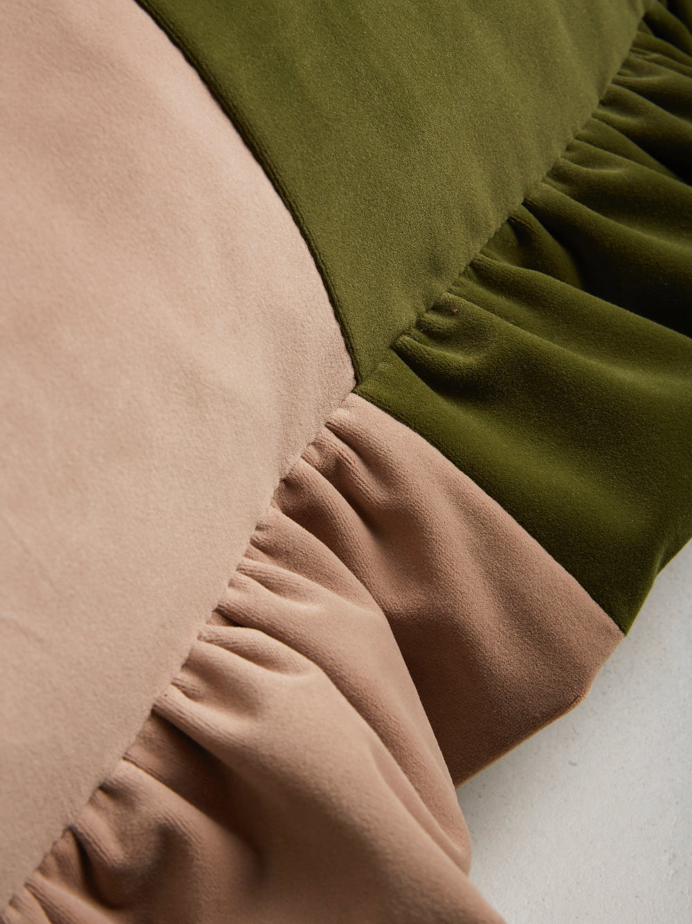 Kika Bespoke two-tone velvet ruffled cushion in Stone and Forest Green