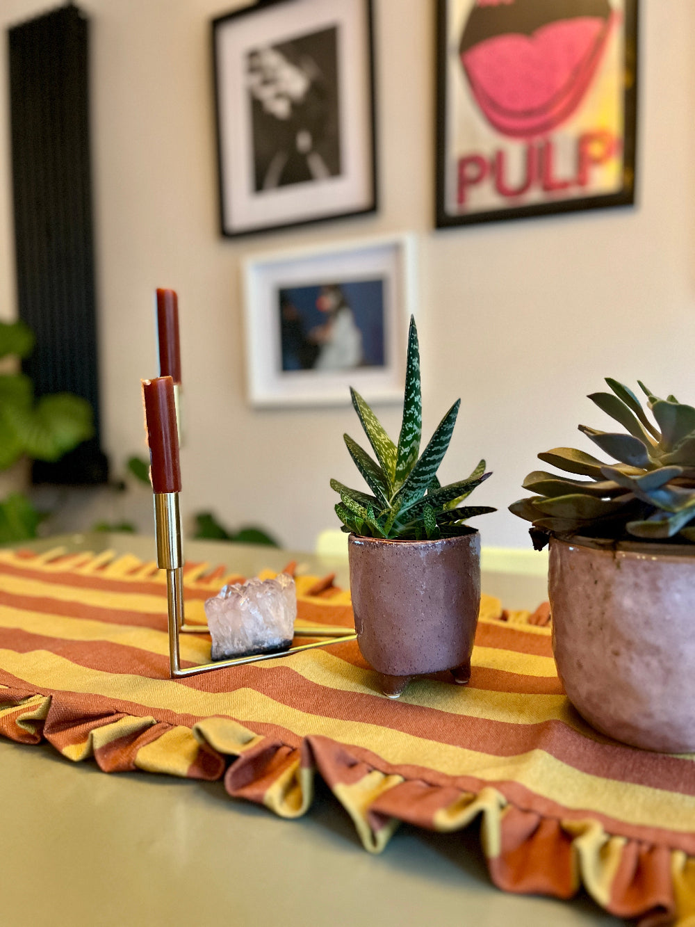 Kika Bespoke striped ruffled table runner styled on a rectangular dining table