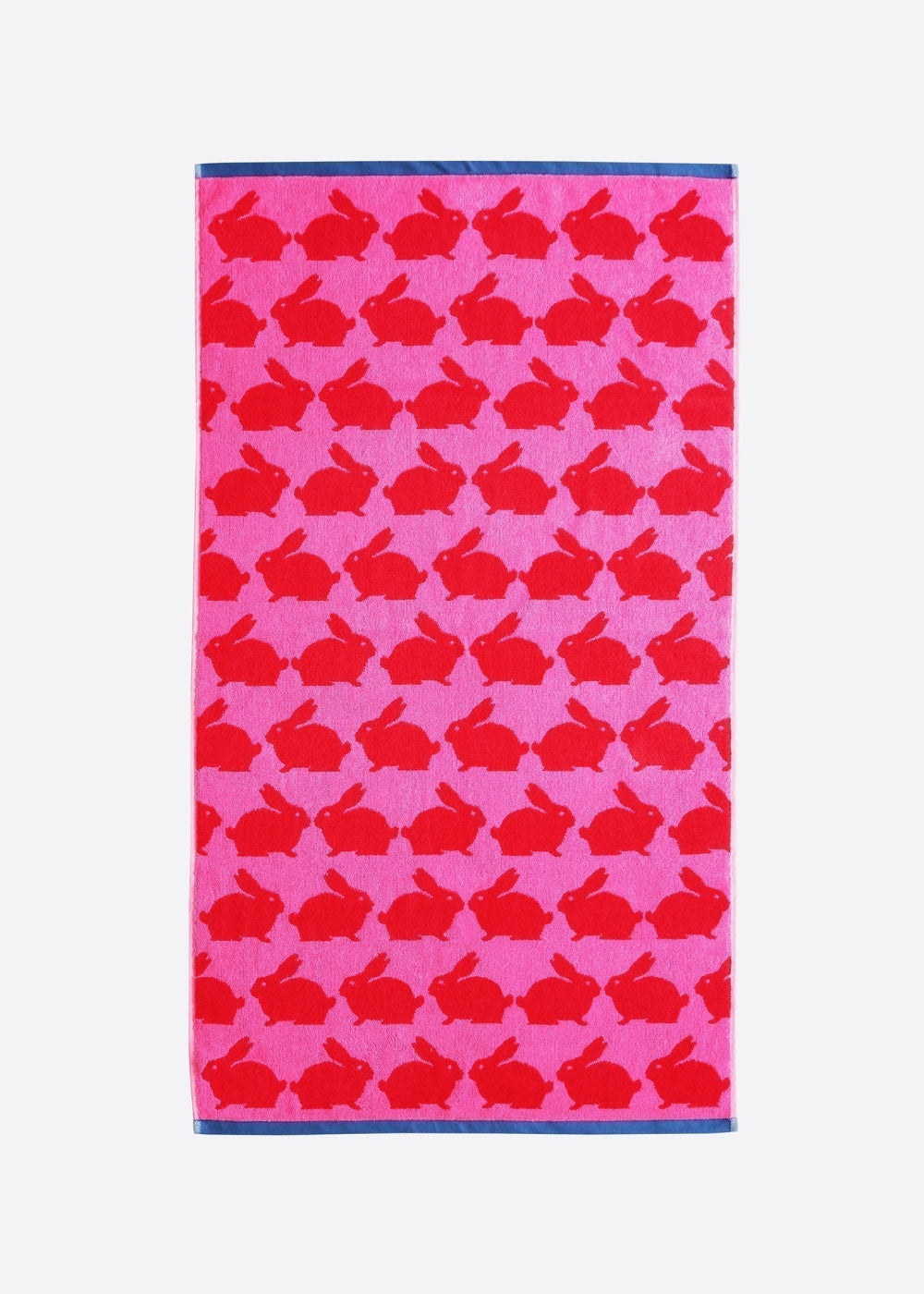 Towel with red bunny pattern on pink background