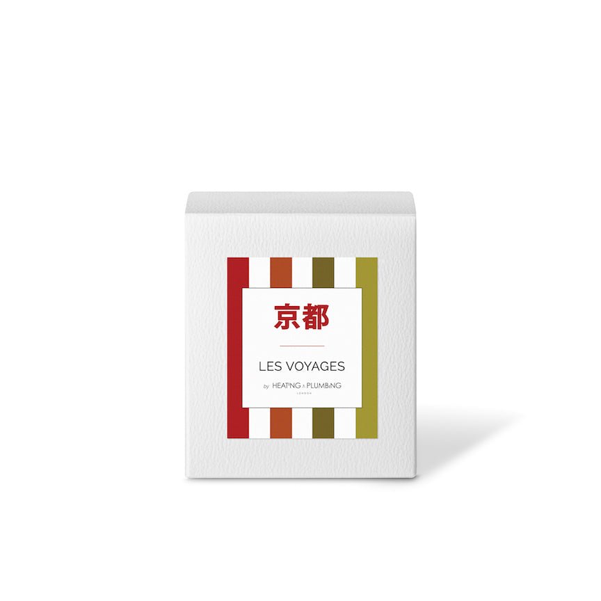 Product packaging with 'Les Voyages' branding on a white background