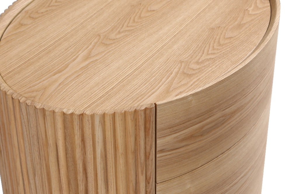 Wooden side table with a round top and cylindrical base on a white background