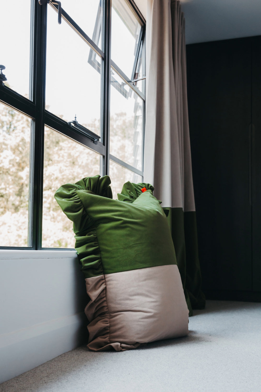 Large two-tone velvet ruffled cushion in Stone and Forest Green