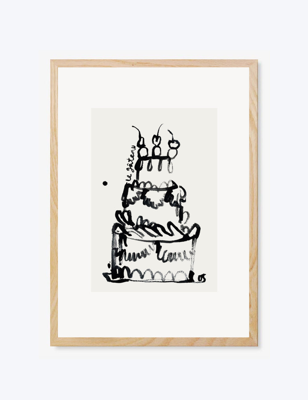 Framed black and white illustration of a cake on a white background