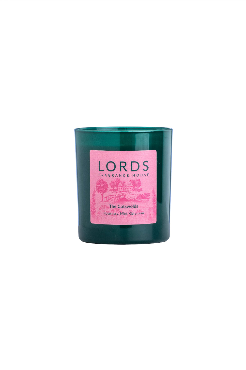 Green candle with a pink label on a white background