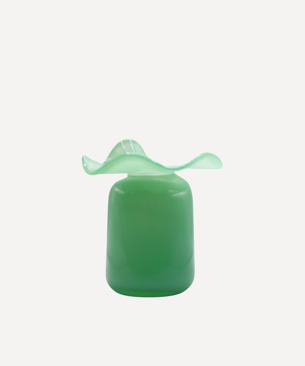 Teal glass ruffle bud vase with wavy top on a white background