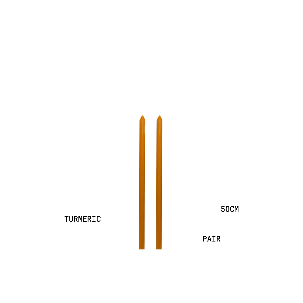 Two turmeric candle sticks with measurements on a white background