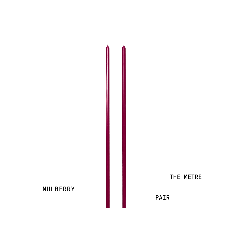 Two red tapered handpoured candles with text 'Mulberry' and 'The Metre Pair' on a white background