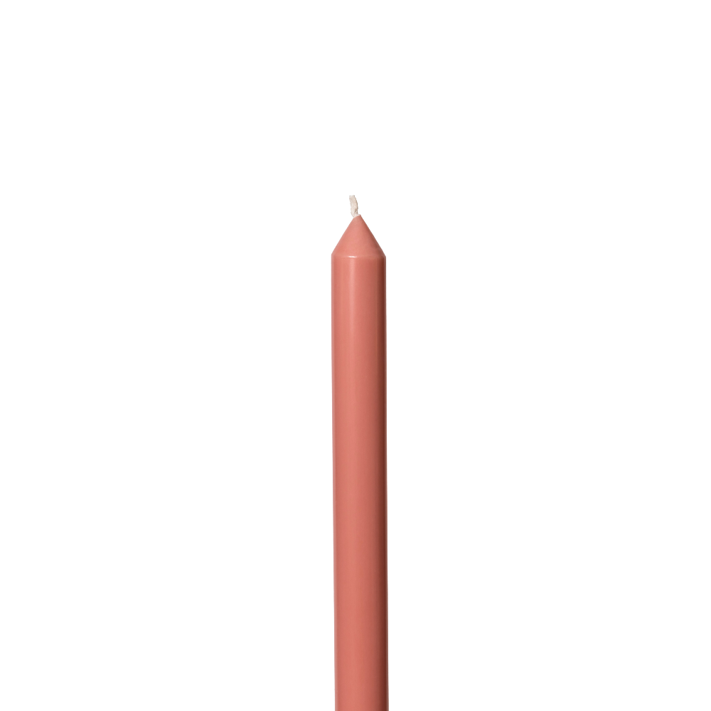 Single pink candle on a white background