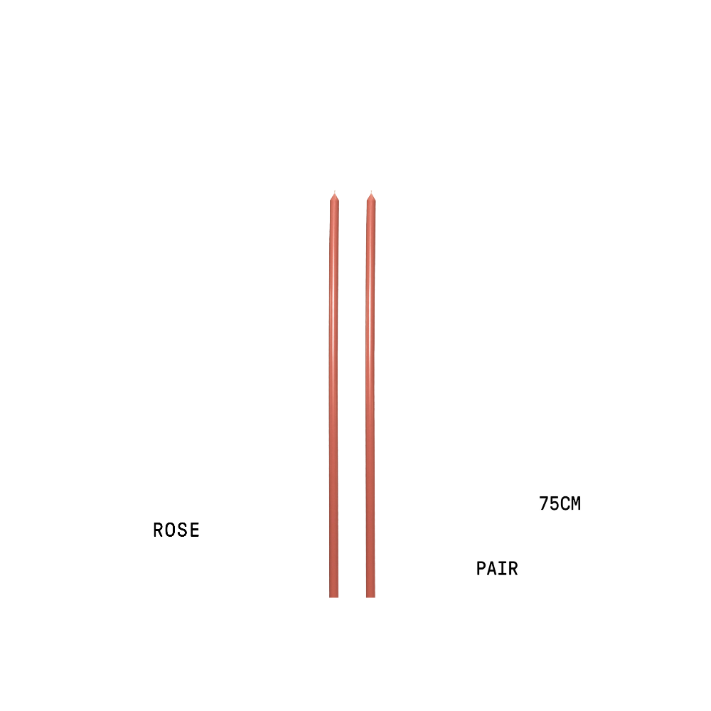 Two rose coloured 75cm tapered candles with measurement details on a white background