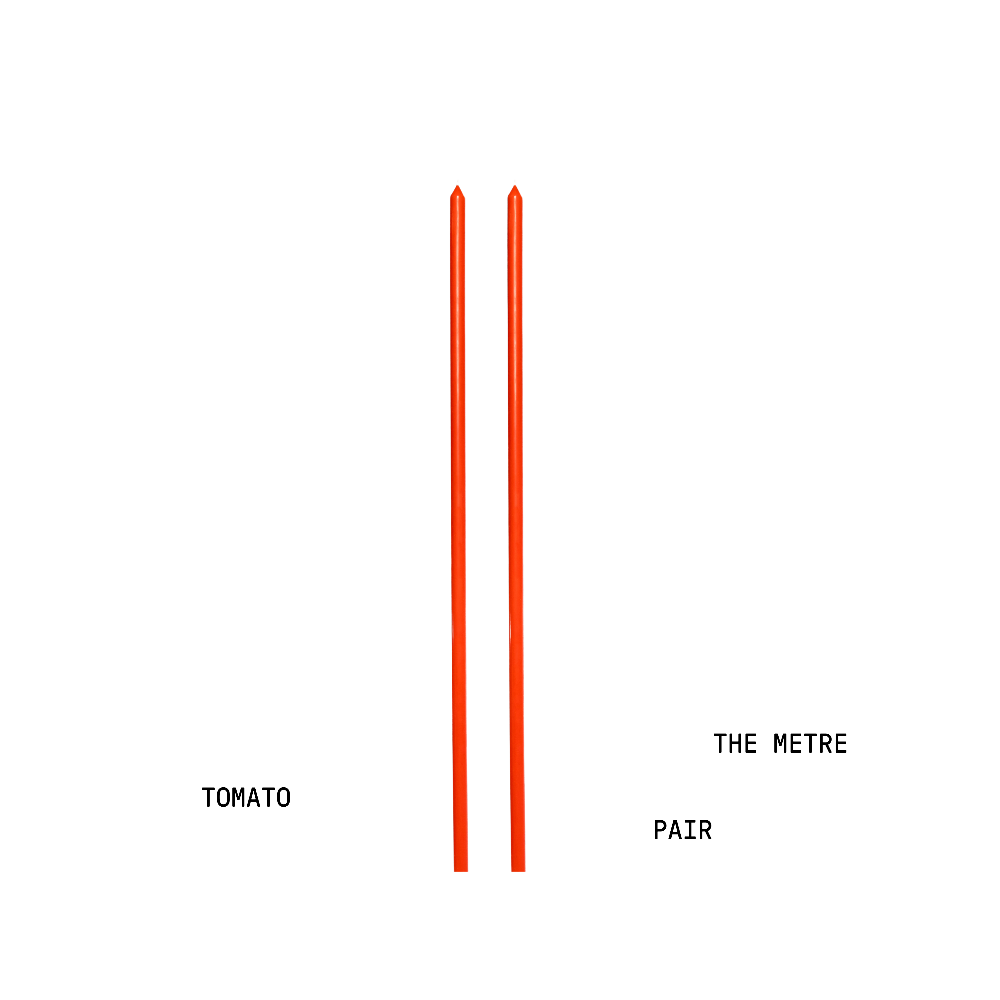 Two metre long candles with text 'Tomato' on the left and 'The Metre Pair' on the right against a white background.