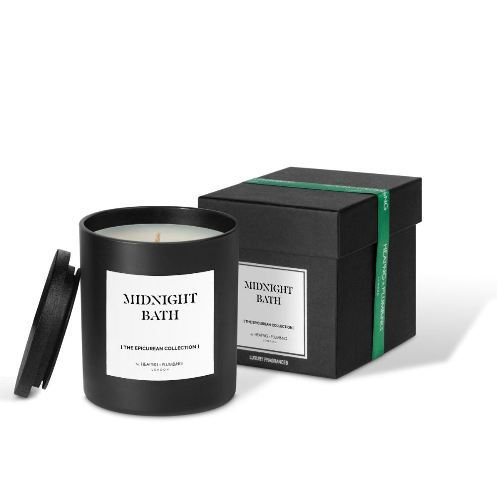 Candle labelled 'Midnight Bath' with packaging on a white background